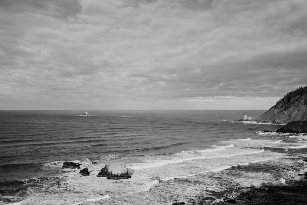 a black and white photo of the ocean