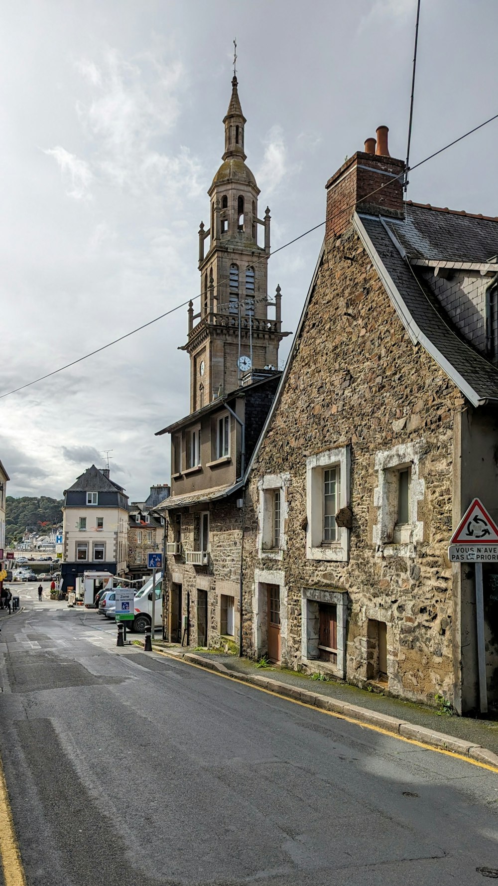 an old stone building with a clock tower