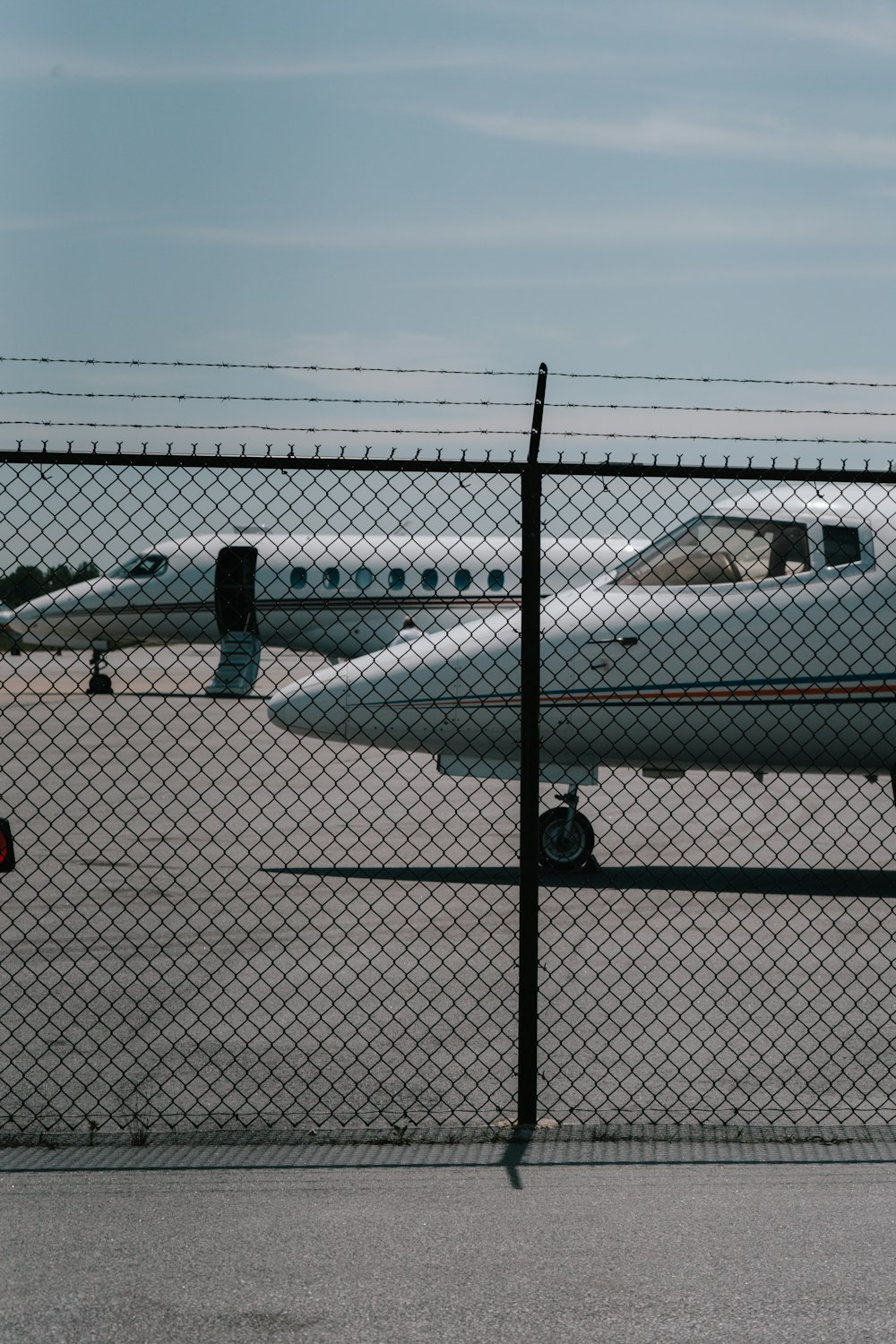 a large jetliner sitting on top of an airport tarmac