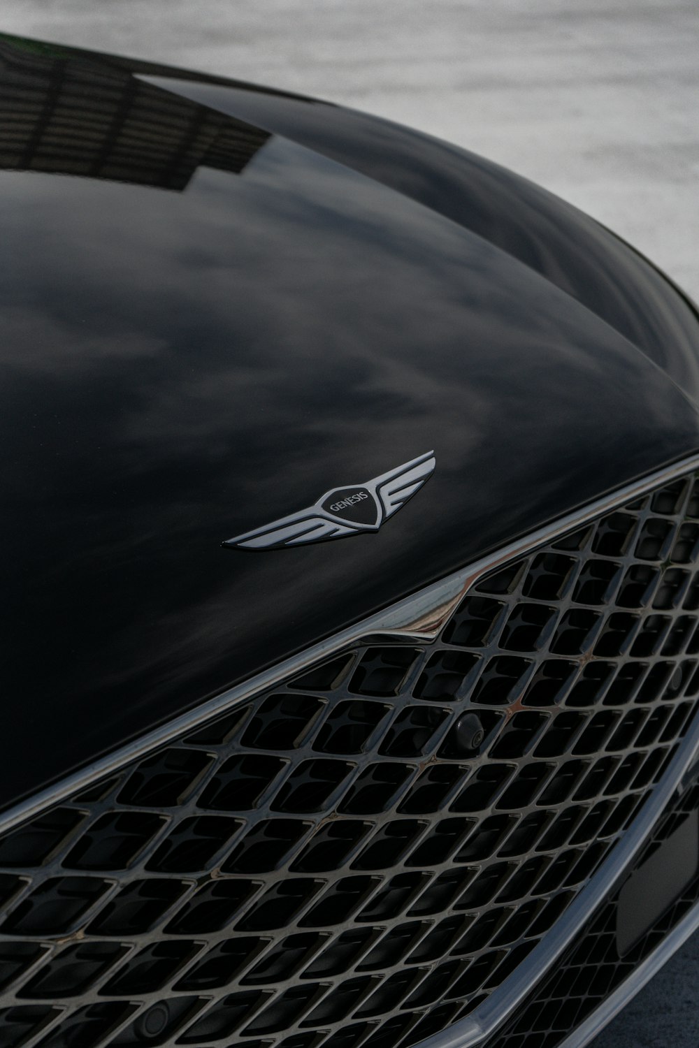 a close up of the front grill of a black car