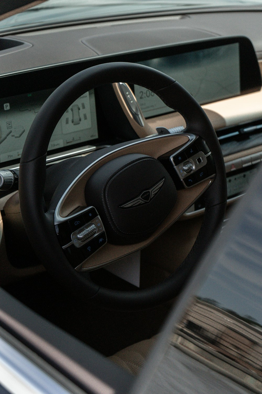 the interior of a car with a steering wheel