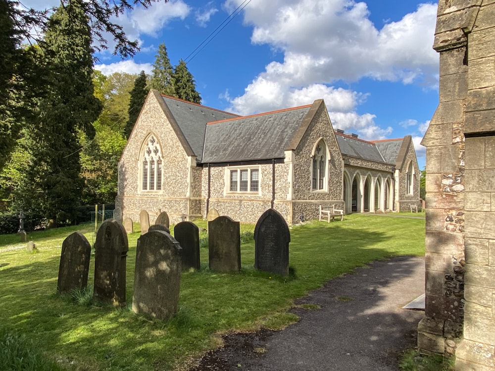 a church with a graveyard in front of it