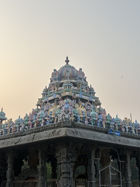 a building with a lot of statues on top of it
