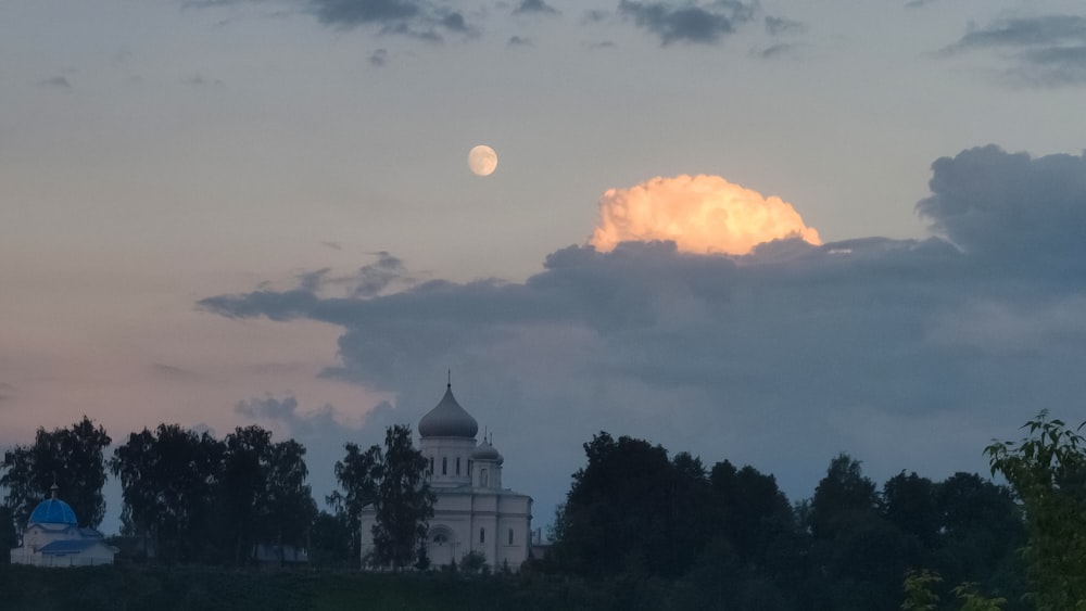 a large white building with a dome on top of it