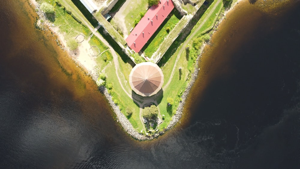 a bird's eye view of an island with an umbrella