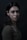 a woman is posing for a picture in a dark room