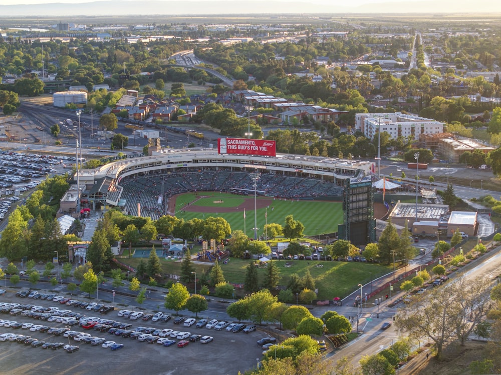 an aerial view of a baseball stadium and parking lot