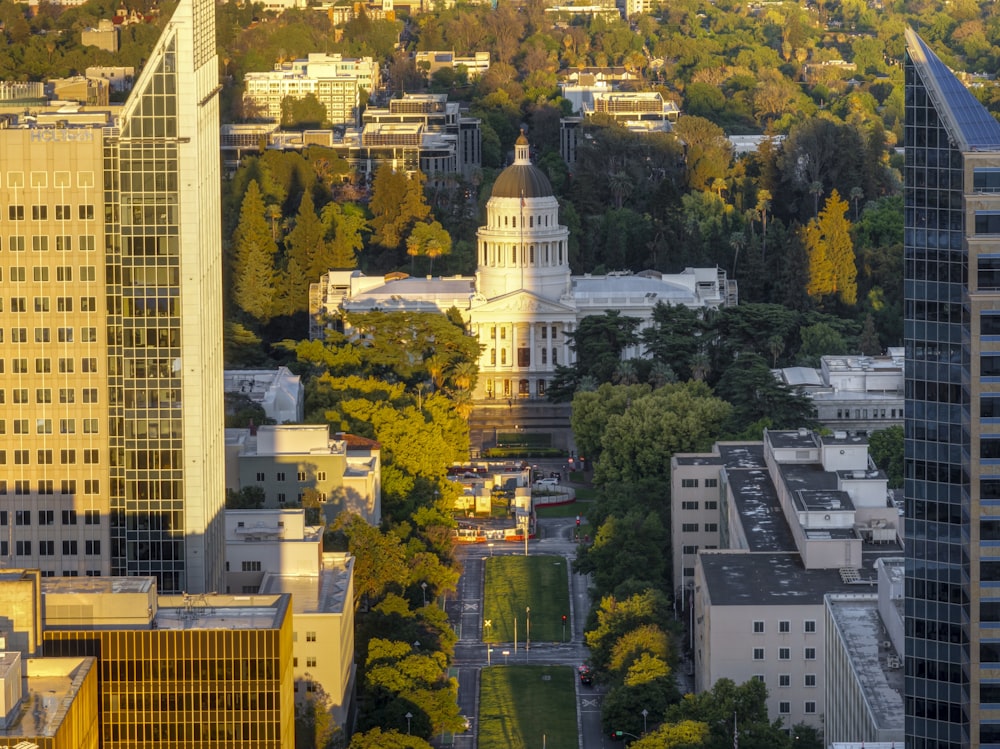 an aerial view of a city with tall buildings