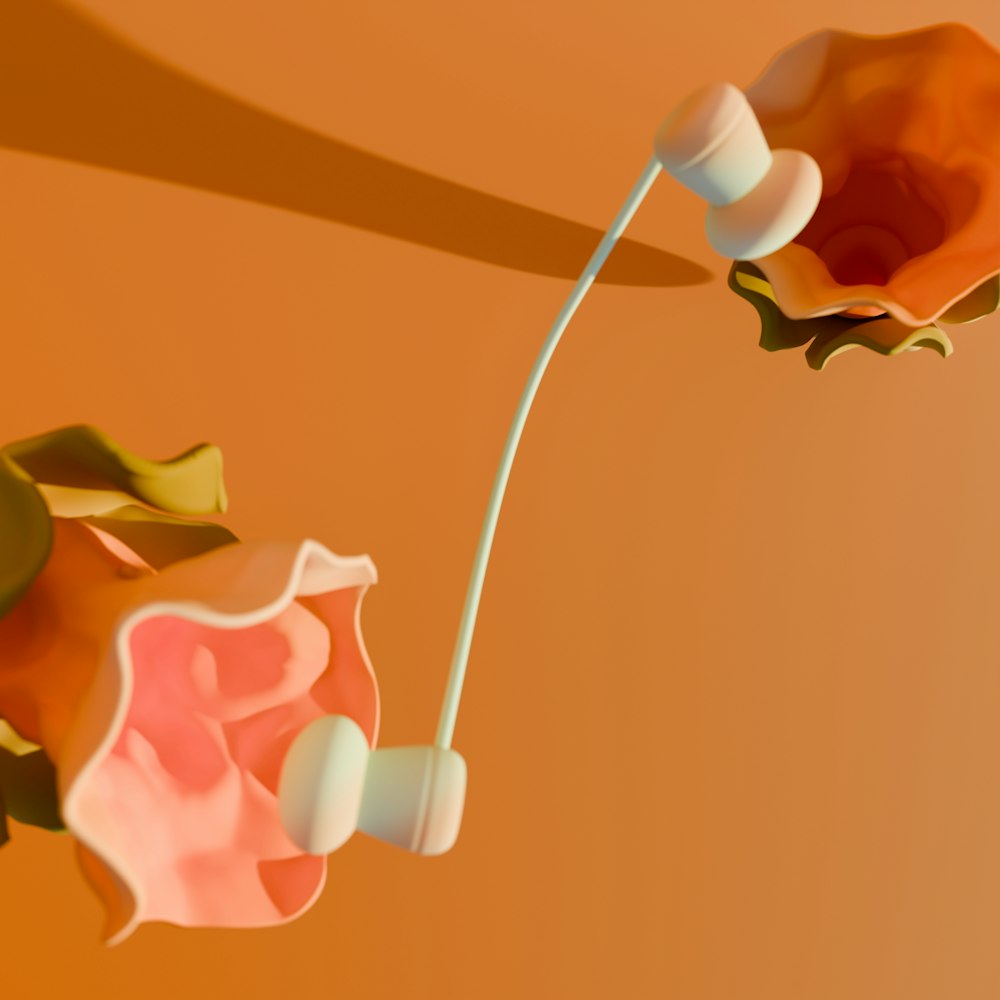 a computer generated image of a flower and earbuds