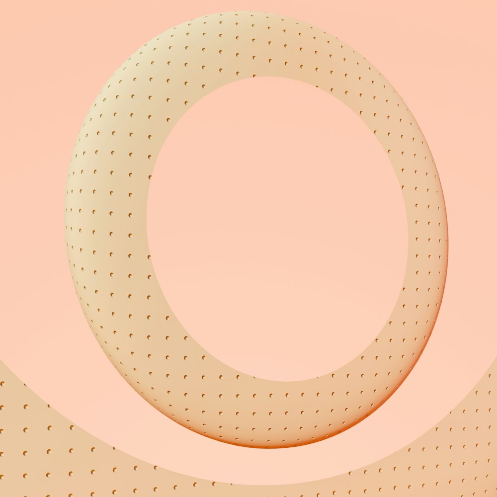 a white circle on a pink background