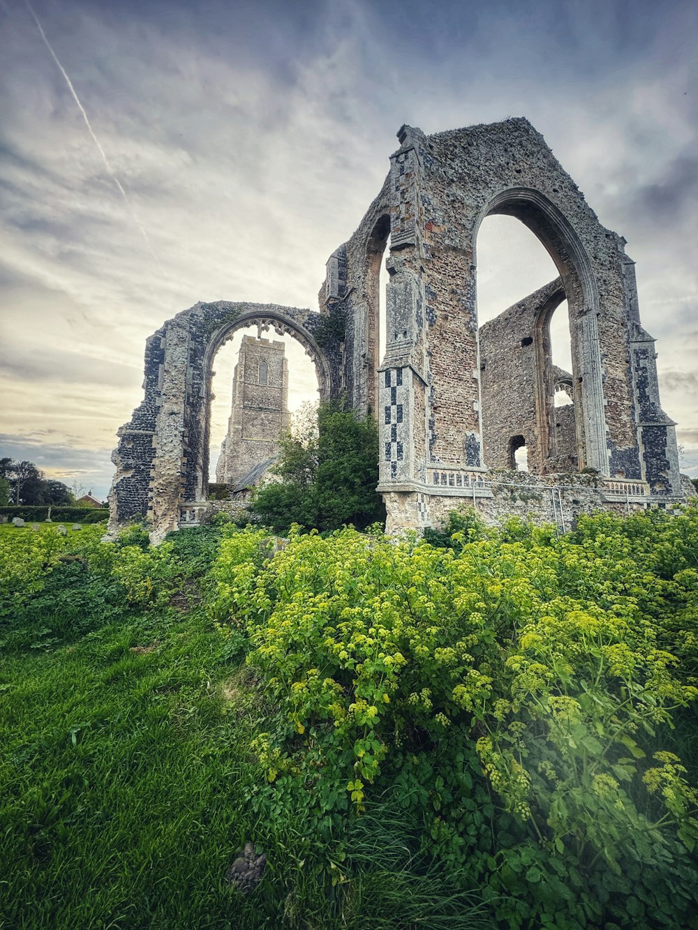 the ruins of an old church on a hill