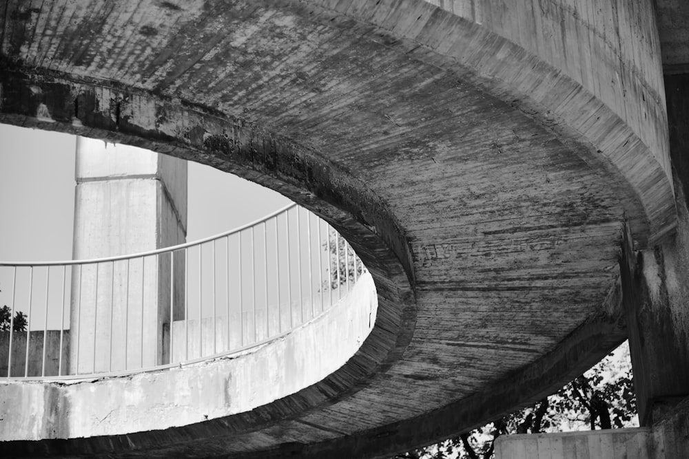 a black and white photo of a bridge