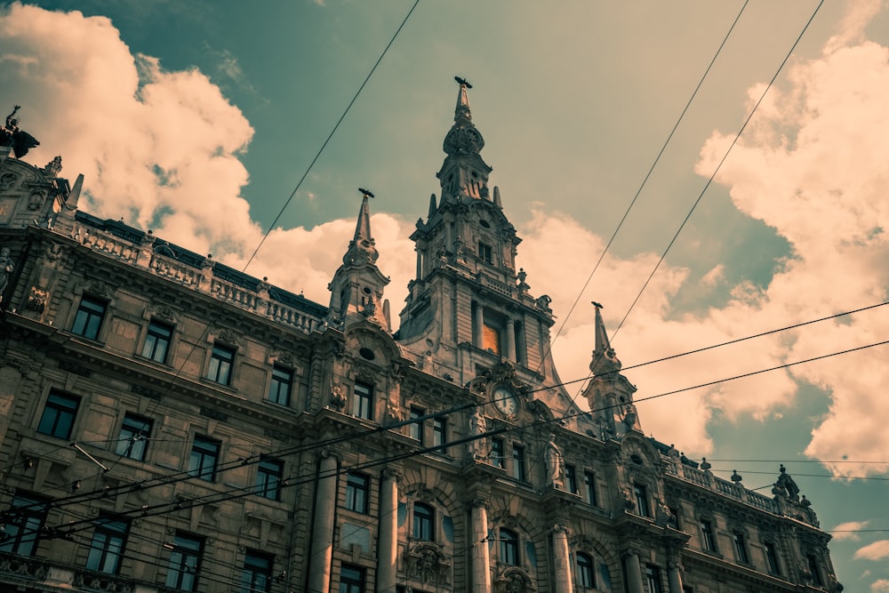 a tall building with a clock on the top of it