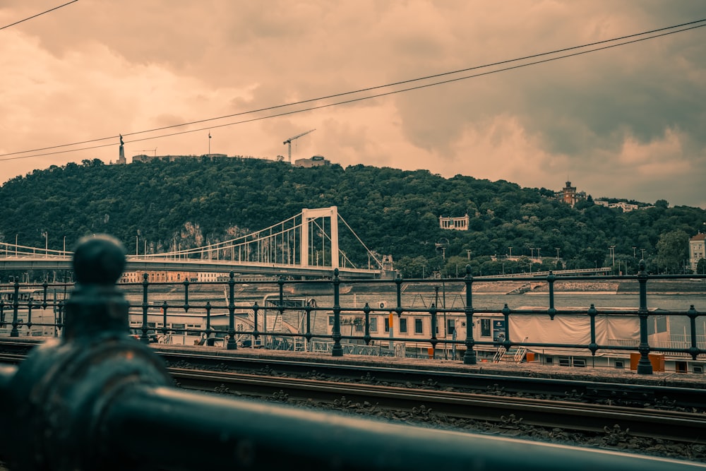 a view of a bridge from a train station