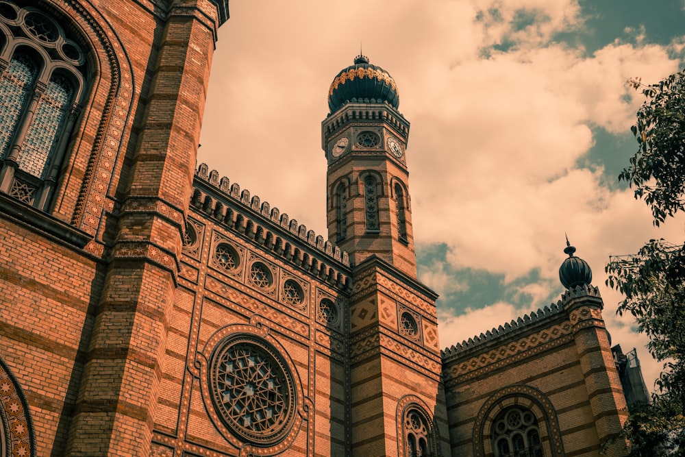 a tall building with a clock on it's side