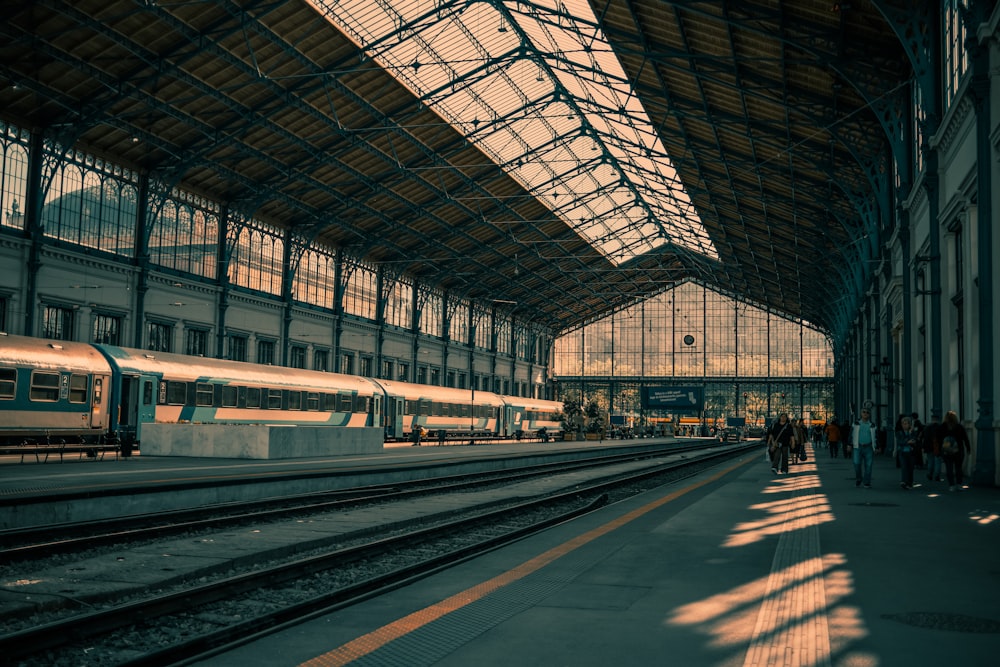 a train station with a train on the tracks