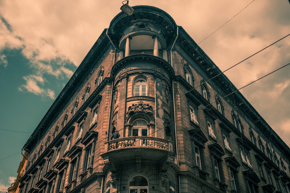 a tall building with a clock on the top of it