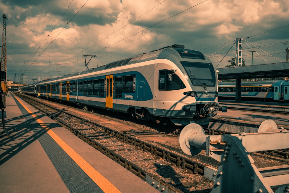 a train on a train track near a platform