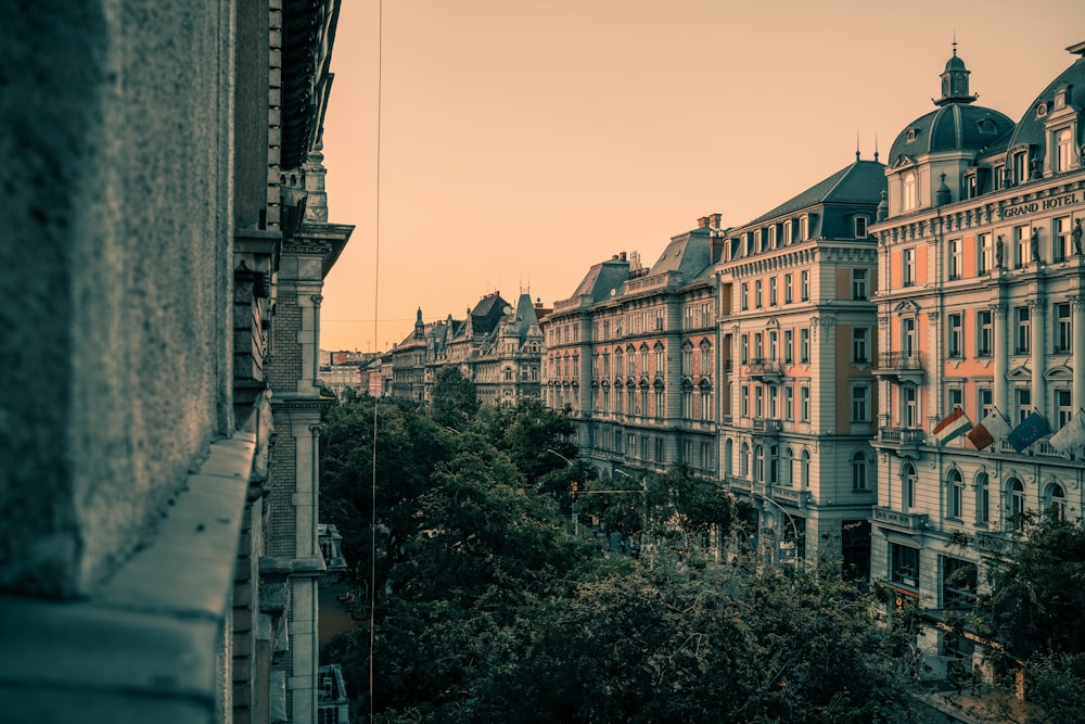 a row of buildings with a sky background