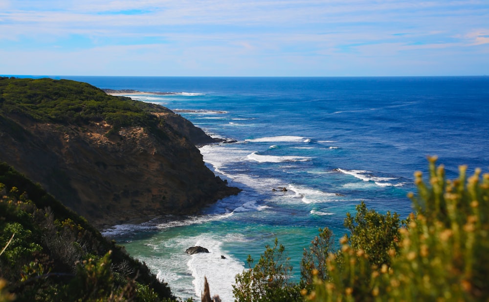 a view of the ocean from a cliff