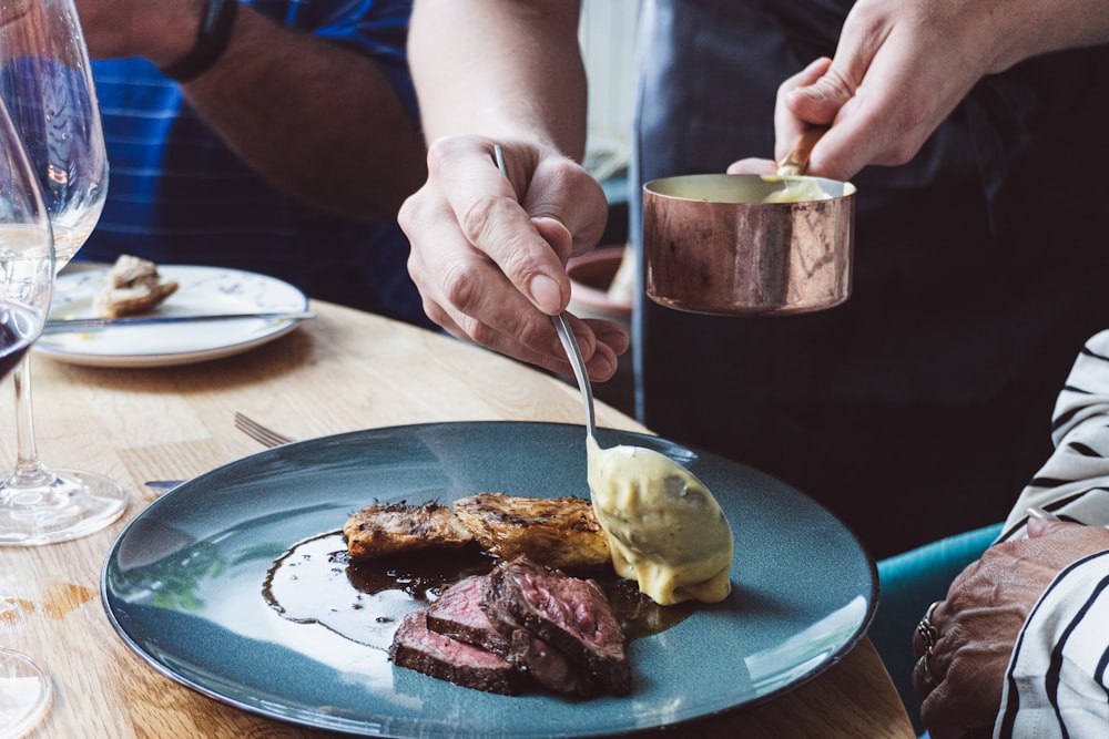 a plate of food on a wooden table