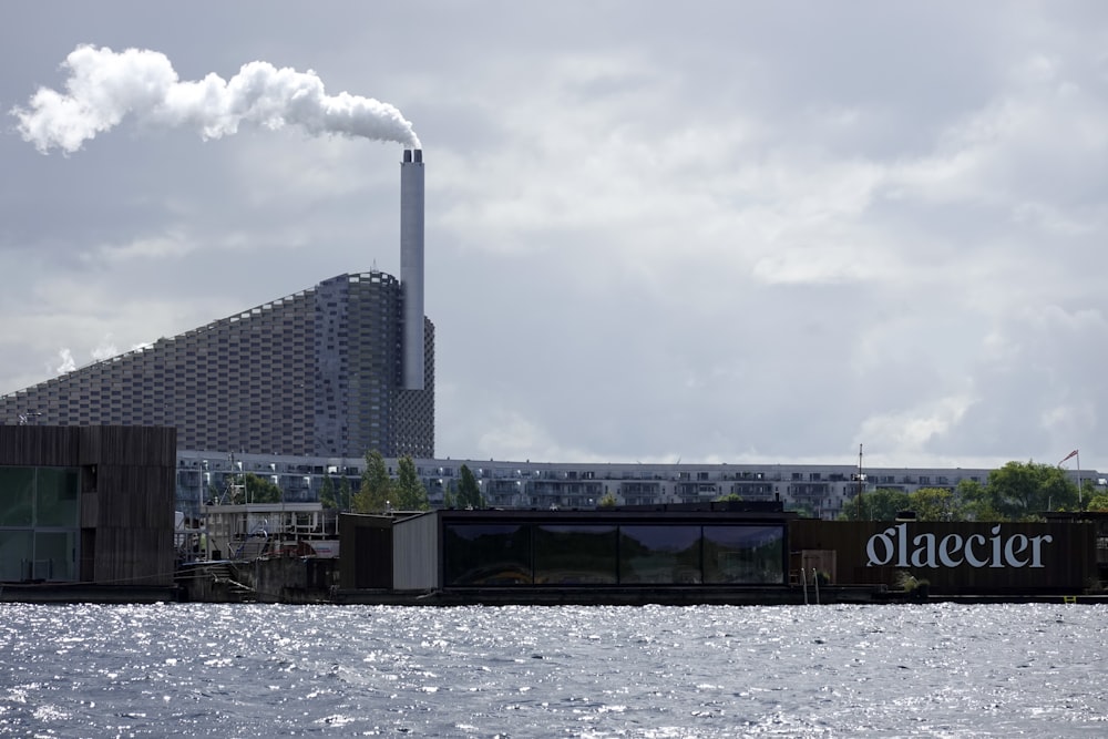 a factory with smoke coming out of it's stacks