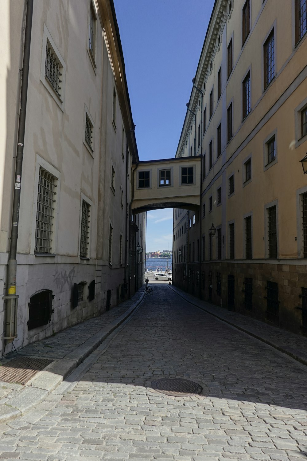 a view of a street with a bridge over it