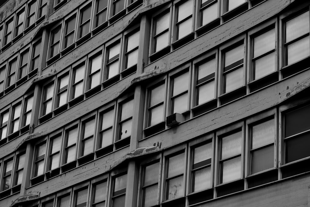 a black and white photo of a tall building