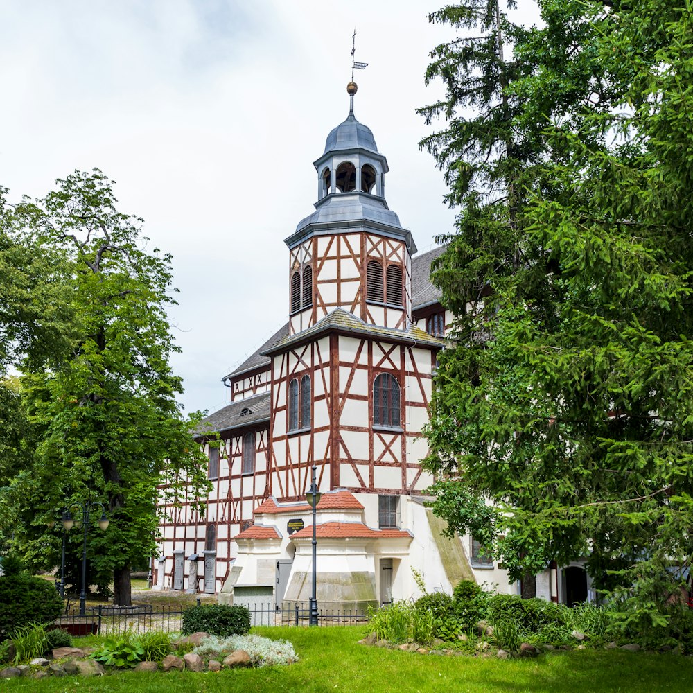 a tall building with a clock on the top of it