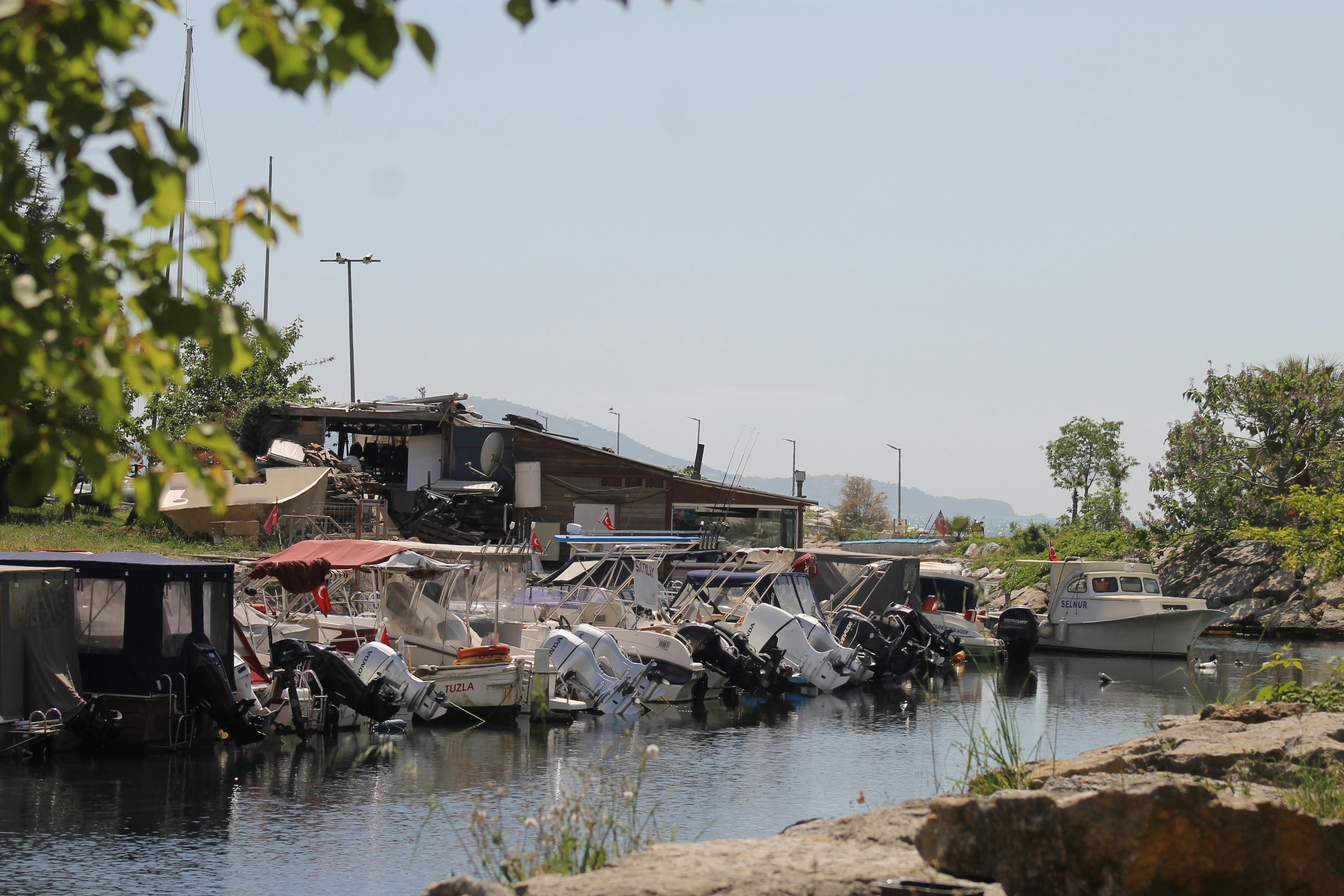 a body of water filled with lots of boats