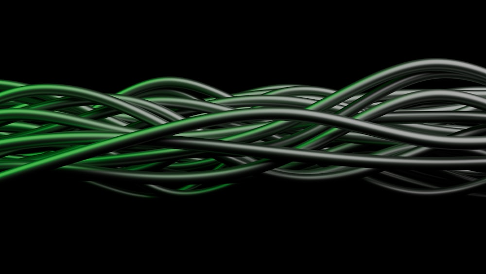 a green and white wire on a black background