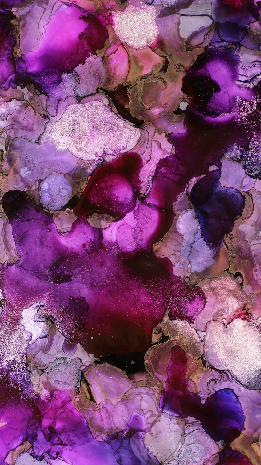 a close up of a purple and white marble