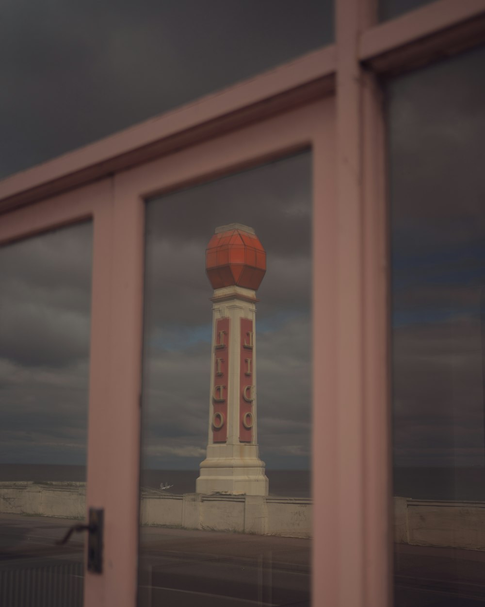 a window with a sign on the side of it