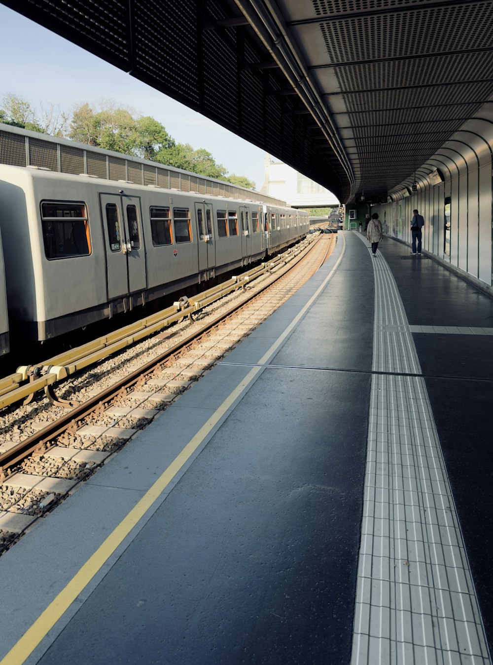 a train is pulling into a train station