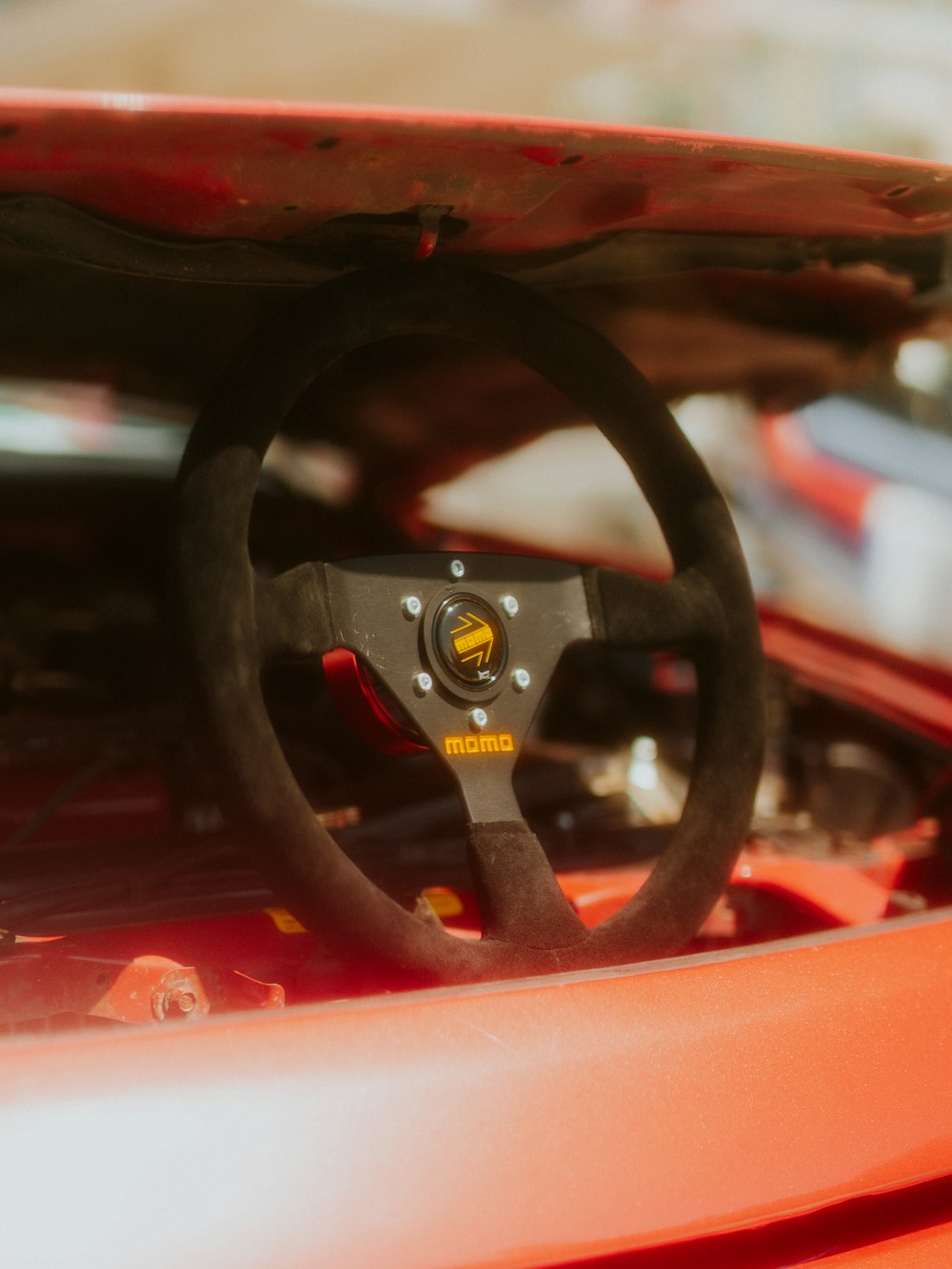 a close up of a steering wheel on a car