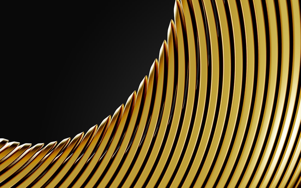 a black and gold background with wavy lines