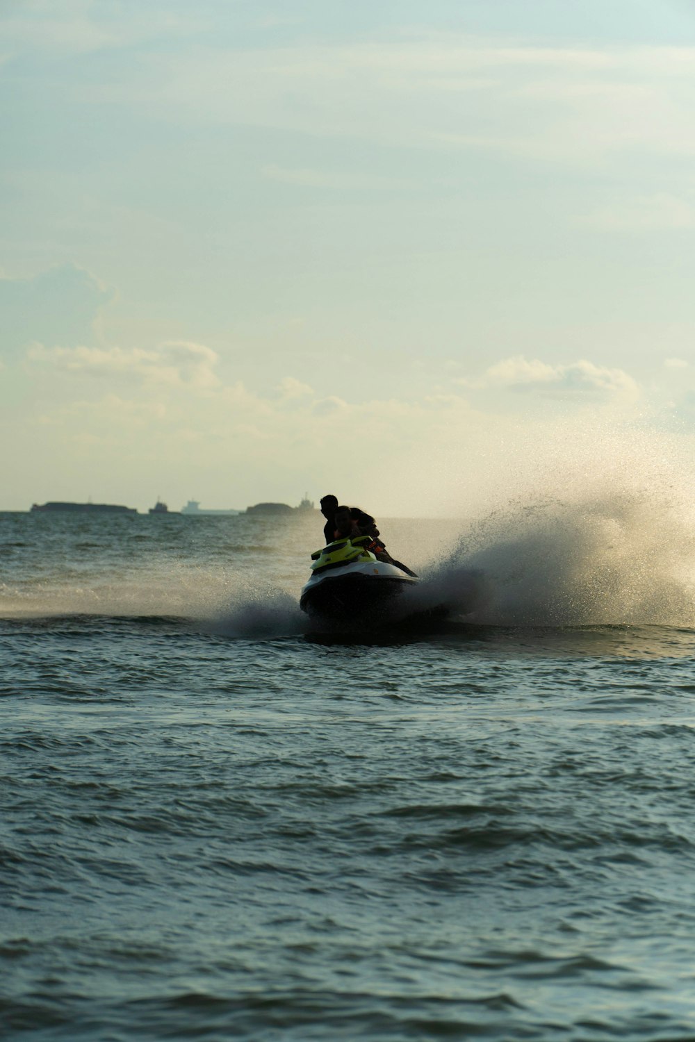 a person riding a jet ski on top of a body of water