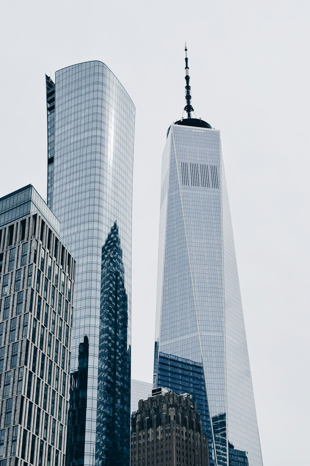 a group of tall buildings in a city