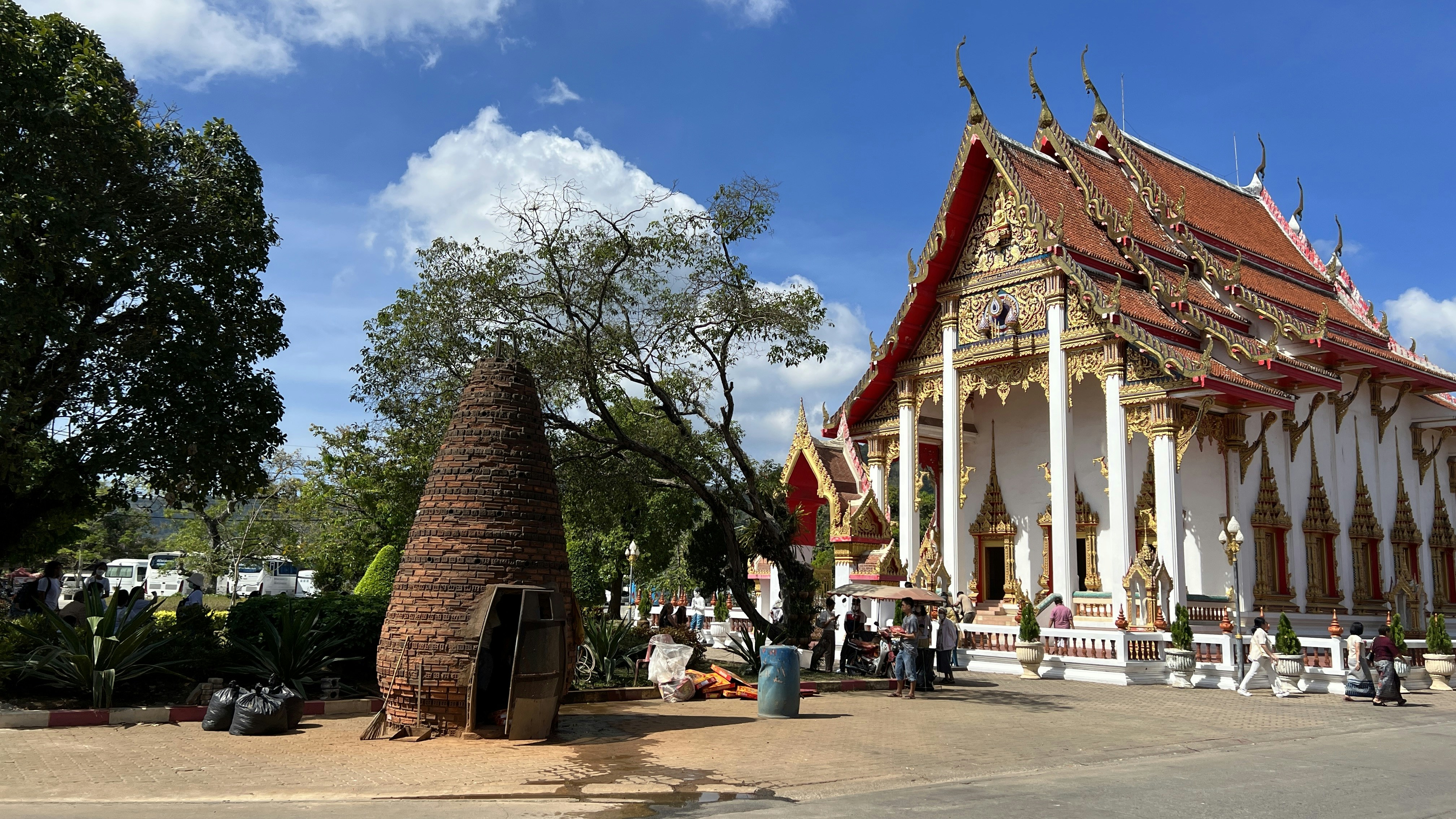 a large white building with a red roof