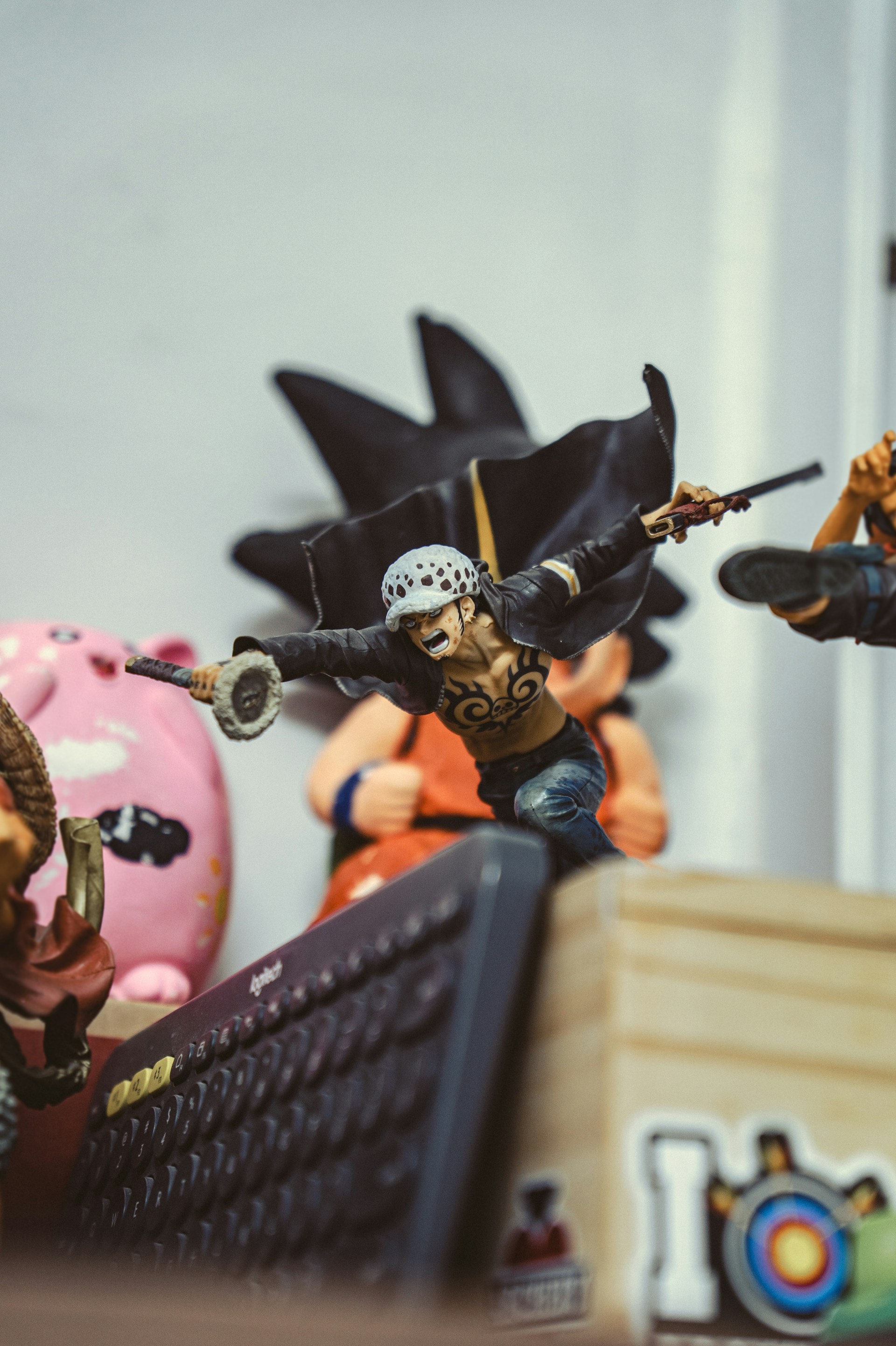a group of toy figurines sitting on top of a desk