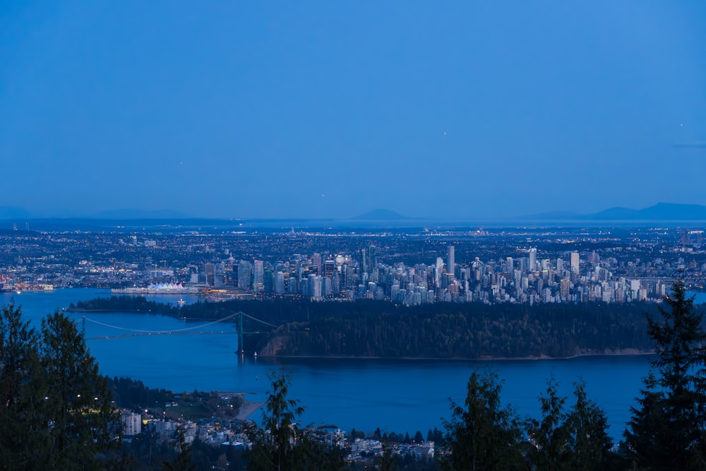 a view of a city and a lake at night