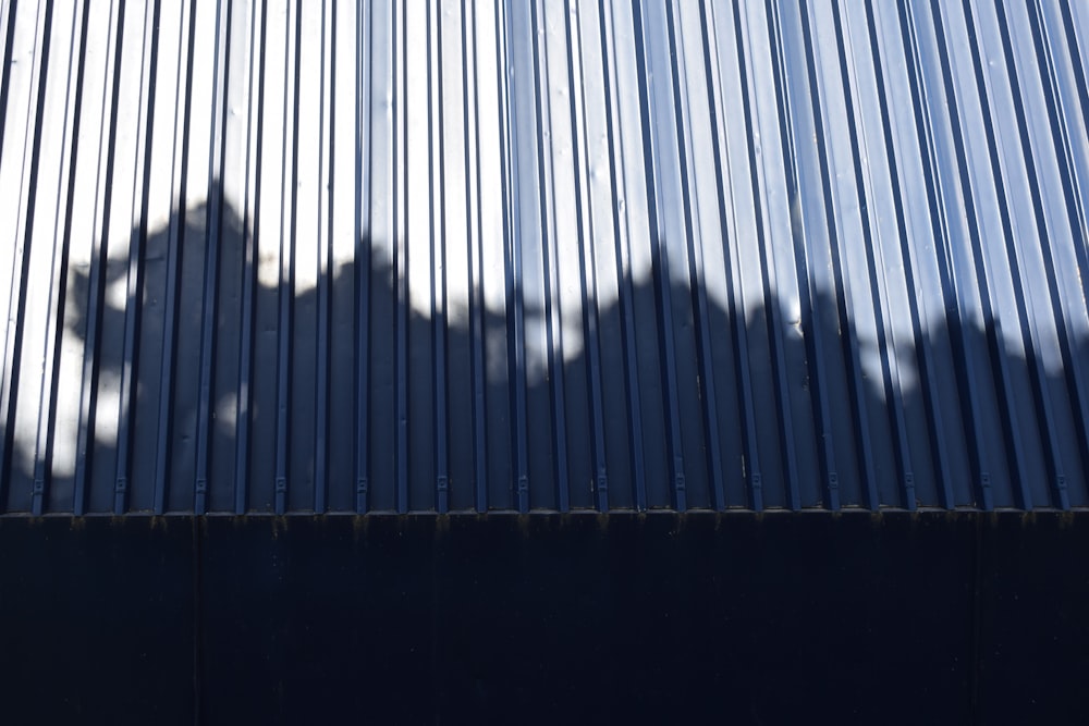 a shadow of a person on a building