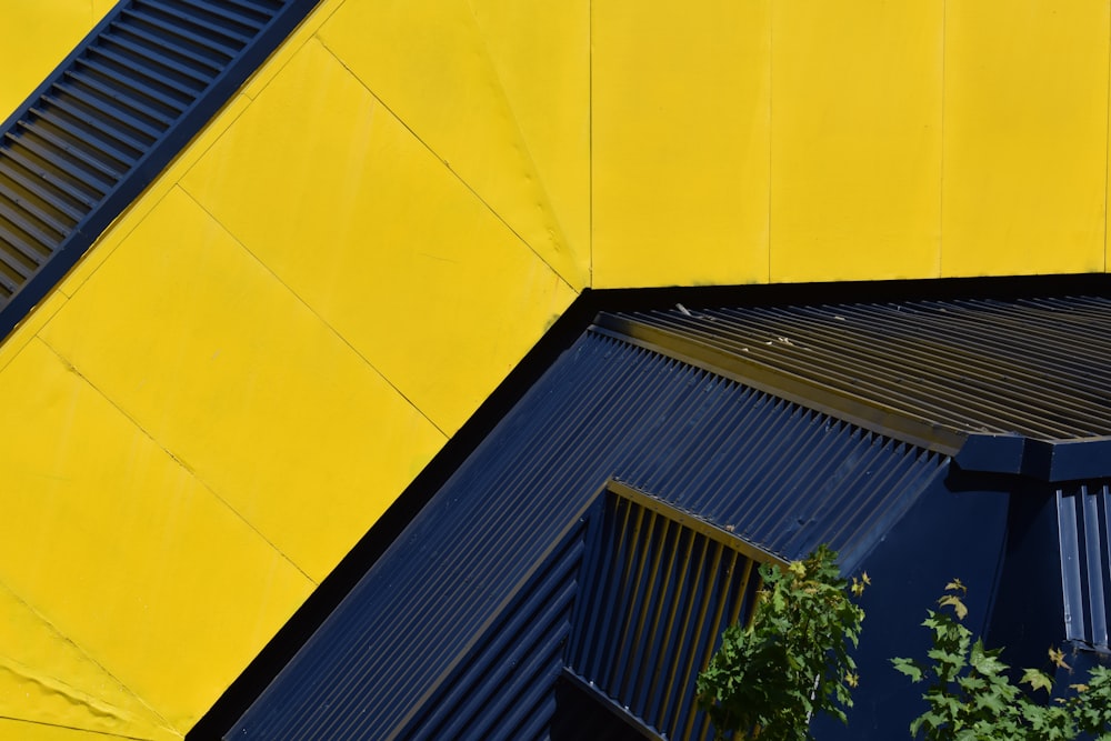 a close up of a yellow and blue building