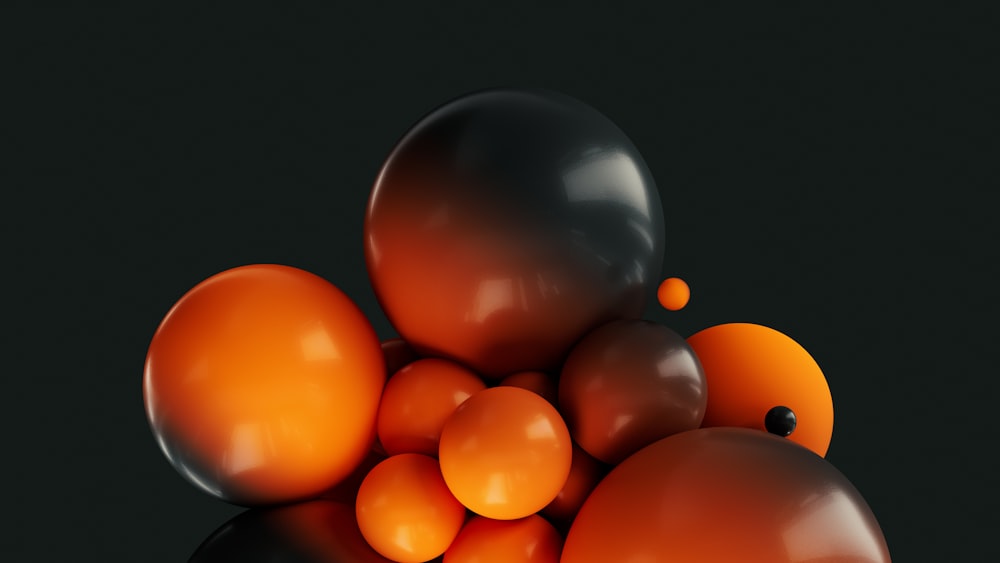 un gruppo di palline arancioni che galleggiano l'una sull'altra