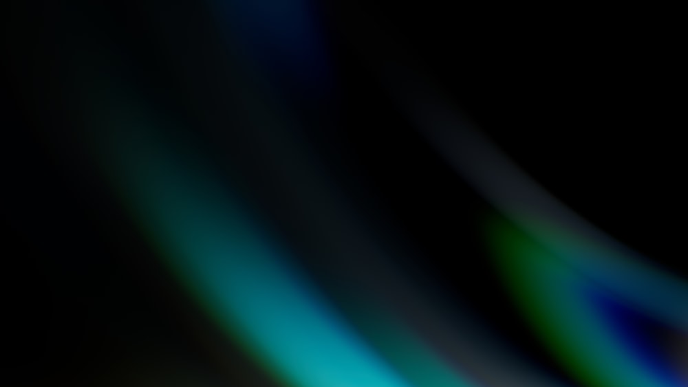 a blurry photo of a cell phone with a black background