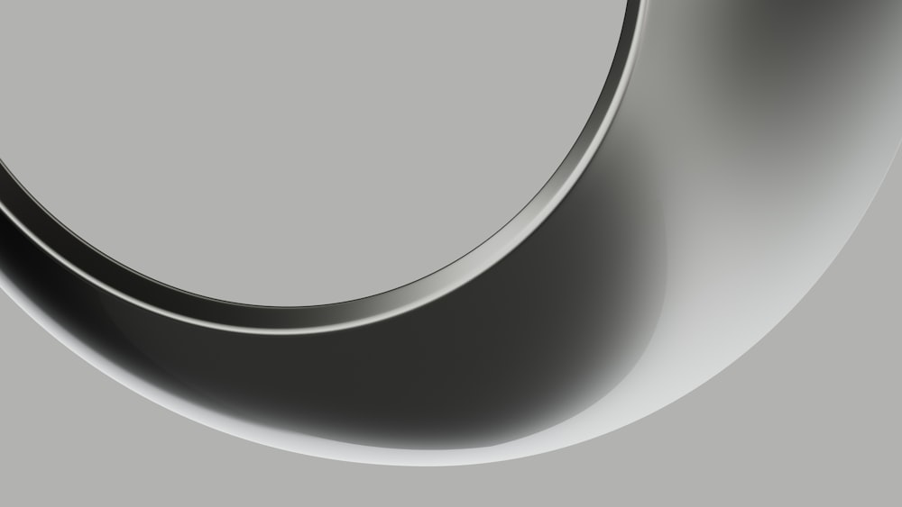 an abstract photo of a curved object on a gray background