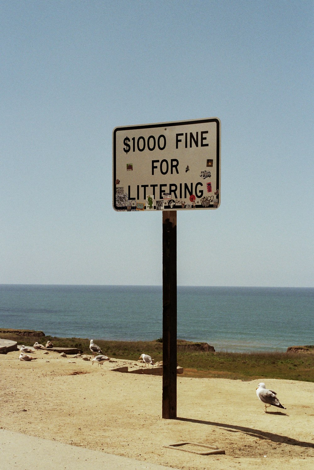 a sign that is on the side of a road