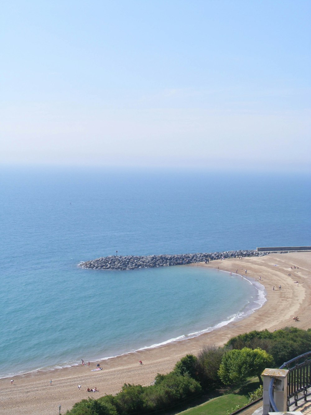 a view of a beach from a balcony