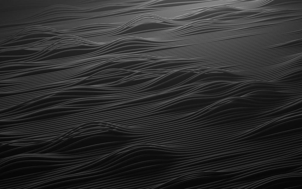 a black and white photo of wavy lines