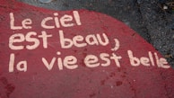 a red rock with a message written on it